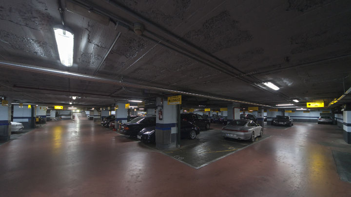 Cars parked by the light of Philips' lighting at NH Hoteles car park