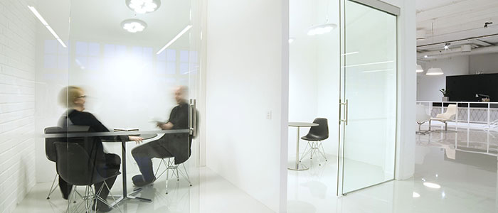 Office area lit up by philips lighting - industrial lighting